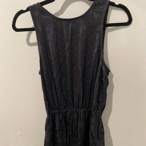 Aritzia black paisley textured romper with an open back